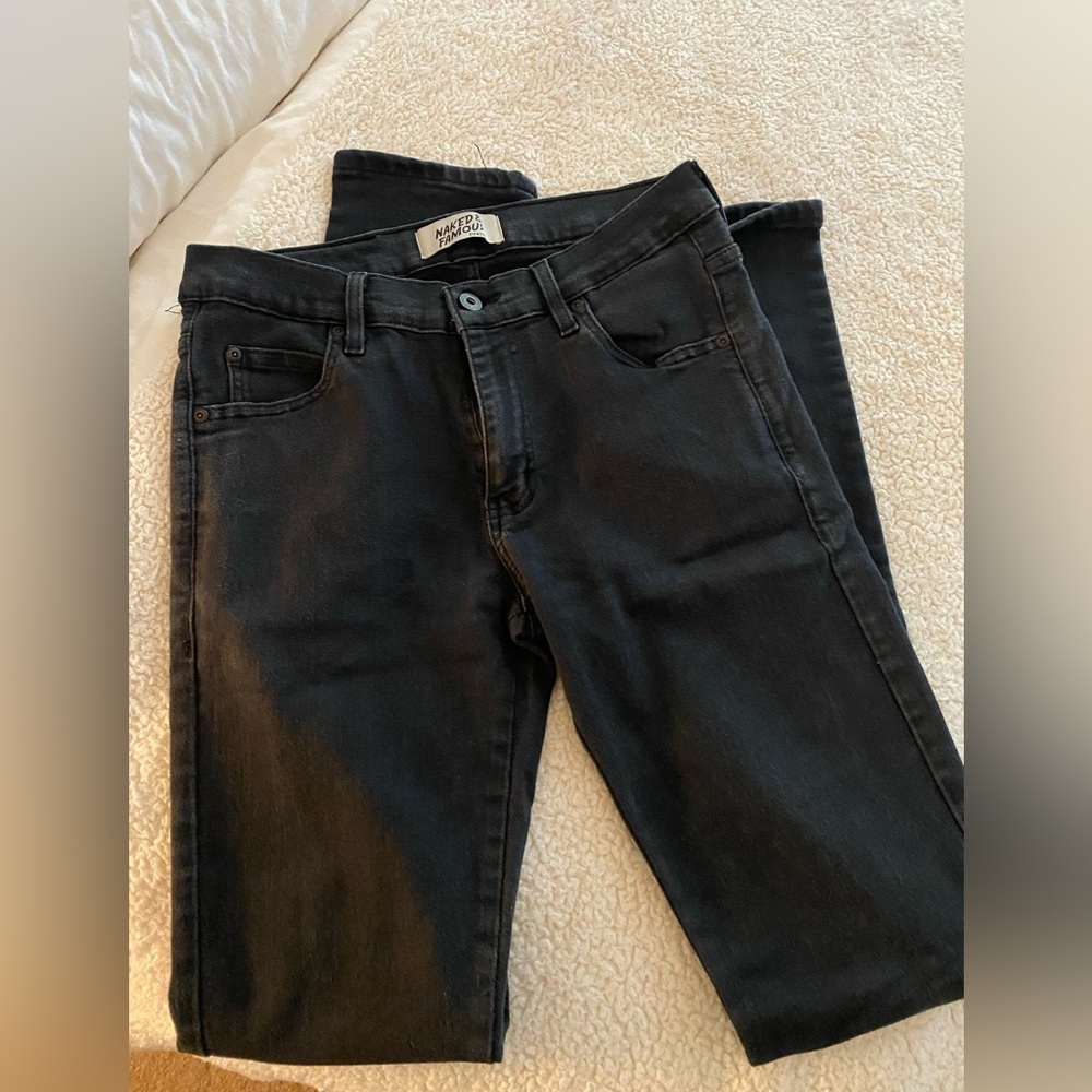 Men’s Naked and Famous black skinny jeans.